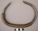 Iron necklet, bound with thin strip of brass, hammered ends (mulinga)