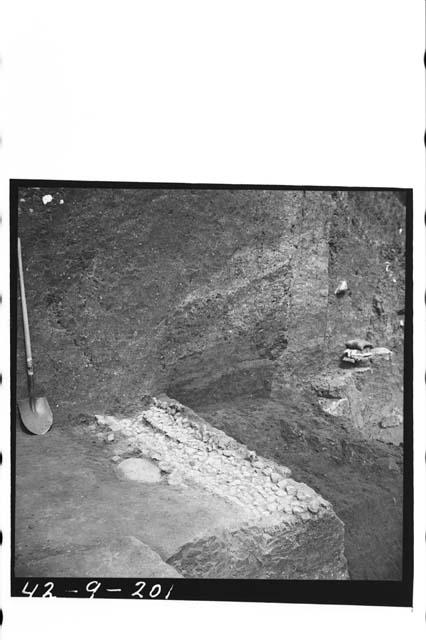 Mound B; Structure E. Cobblestone drain in fill