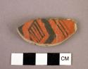 Worked sherd (black/red)