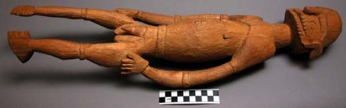 Wooden effigy of man