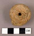 Clay disc, perforated (spindle whorl)