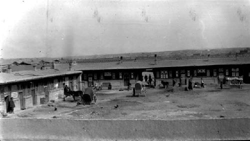 Buildings with carts in front