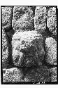 Stone head in wall, Str. 11