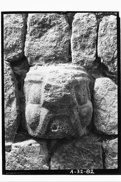 Stone head in wall, Str. 11