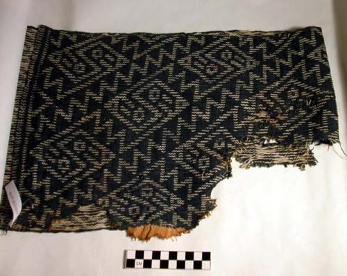 Woven band, warp-patterned, blue and white diagonal bird motif