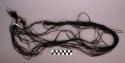Ornament of braided human hair