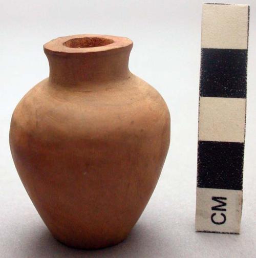 Small carved wooden jar without a  stopper and lacking a plug for the bottom. H: