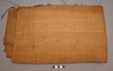 Large piece of woven straw cloth, fringe on one side