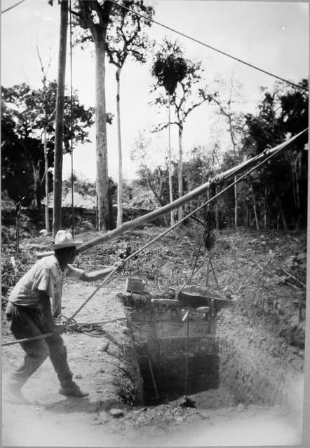 Excavating Pit 4, wheelbarrow and boom