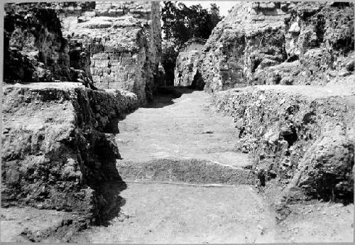 A-V: looking S down main N-S trench from N Plaza. Foreground, lower terrace wall