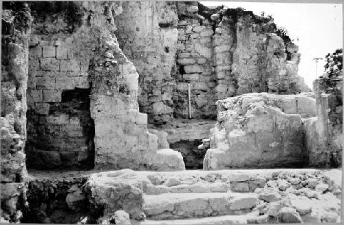 A-V: looking East thru doorway into Room 19, A group. Primary & secondary walls