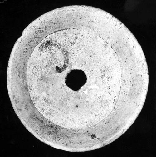 Ceramic bowl, flaring rim, hole at center