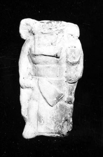 Ceramic figurine, anthropomorphic, standing figure, head missing