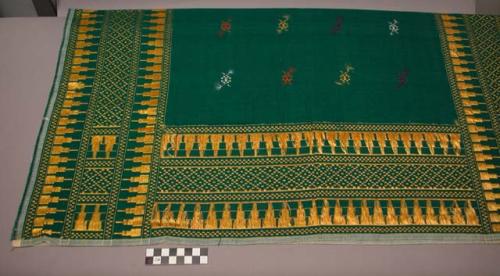 Square piece of brocaded textile - green with yellow designs