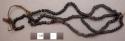 Bracelet, small black shells, triple strand, strung on 2-ply cord