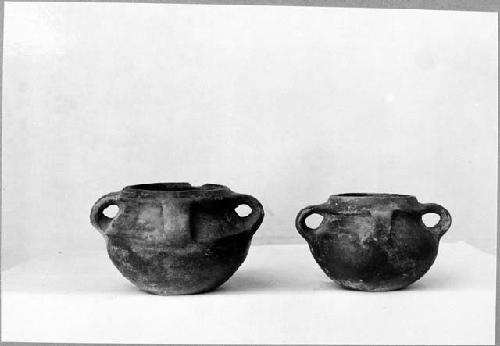 2 small four-handled vessels