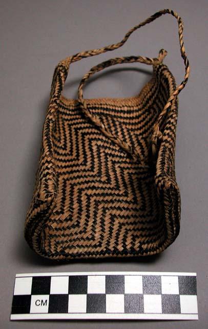 Man's basketry pouch for carrying personals (shell money, betel nut, +