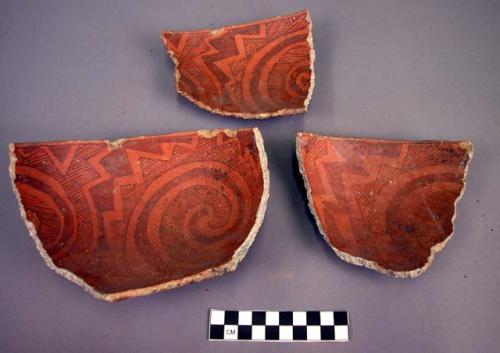 Pottery seed bowl - black on red, geometric design on inside