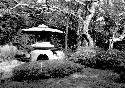 Stone lantern sculpture in garden