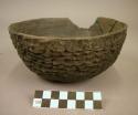 Bowl with rim sherd missing-corrugated?