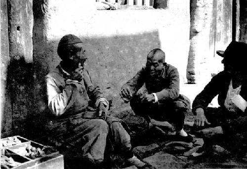 Janet Wulsin and Chinese man with cobbler on street