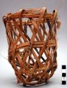 Basket, reed, open weave, cylindrical, hole in base, twisted fiber tie
