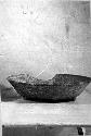 Ceramic tripod bowl, sherd missing from flaring rim