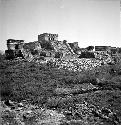 Castillo (Str. 1) from South doorway of Cenote House (Str. 35)