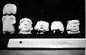 Jonuta figurine heads. Probably all whistles, a) certainly FO paste with noticab