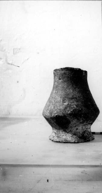 Ceramic pedestal vase, chipped rim