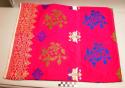 Red and purple cotton brocaded skirt with colored designs; gold +