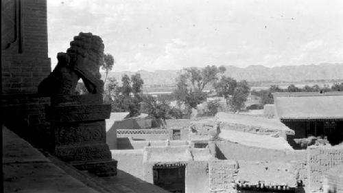 Buildings with mountains in distance