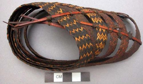 Man's armlet, made of six plaited strips of bamboo, worn above elbow