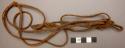 Braided strap, narow, knotted ends, yellow stitching on one side