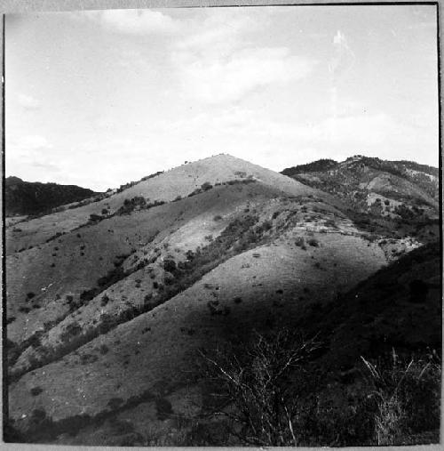 Looking at round structure hill from Cahyup.