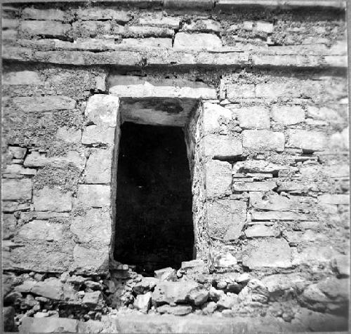 Structure 59- Detail of east facade showing doorway & construction detail.