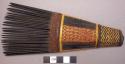 Comb with plaited handle