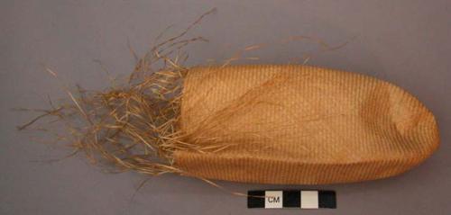 Small unfinished bag of palm leaf