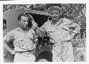 Gordon Willey (R) and unidentified man in front of Jeep