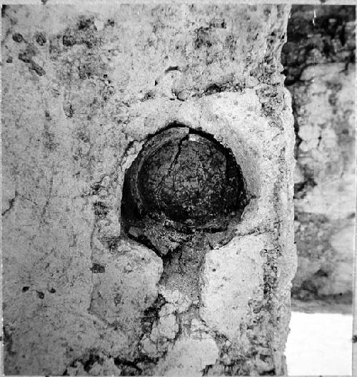 A-V: hole with base of pot in it just East of doorway at South end of Passage 8