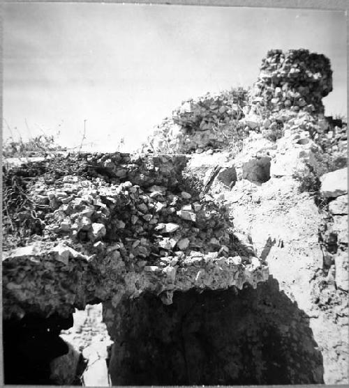 Str. 34 - Roof cap (fallen) in North end of rear room.