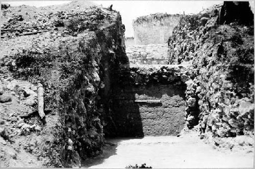 A-V: looking West at early terrace wall in main E-W. trench under Construction U