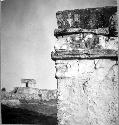 Temple of Frescoes (Structure 16) - Sculptured face on NW corner of building.