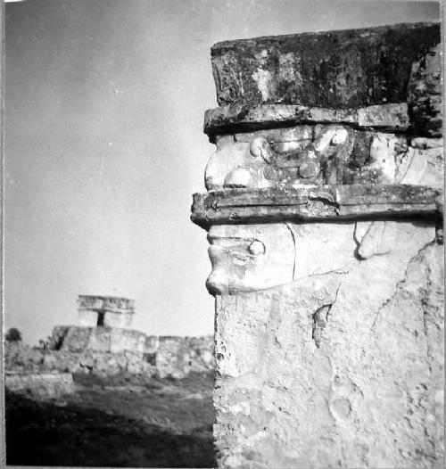 Temple of Frescoes (Structure 16) - Sculptured face on NW corner of building.