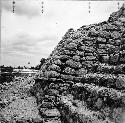 Detail of terrace masonry on mound at north side of plaza - from east