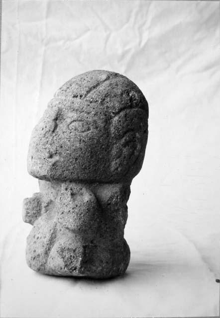 Stone sculpture, seated human fig.  Ht 19 cms