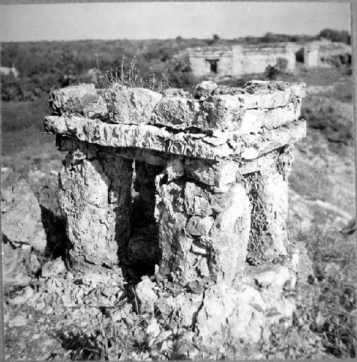 Structure 43 - southeast view - Cenote Temple in background.  Shrine.