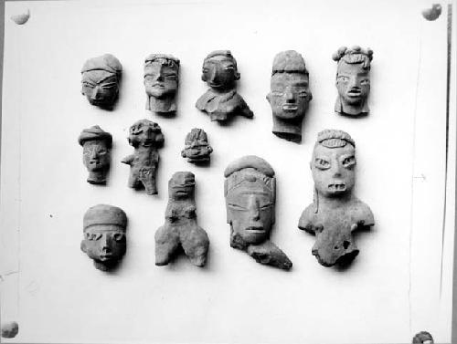 Figurine heads (12)