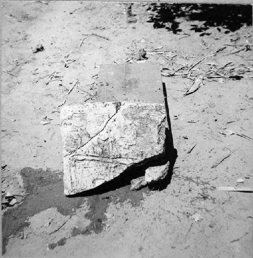 Limestone tablet broken in 2 parts, as found in situ on SE side of platform 53-2