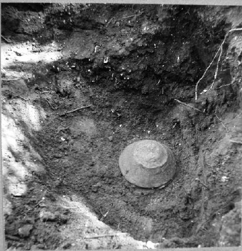 Coarse reddish bowl found in Test pit, front of temple mound below cylinder 53-2